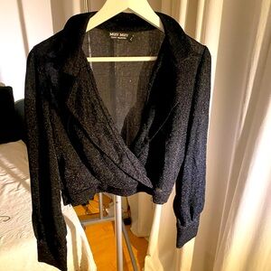 Beautiful and unique shinny glittery top with leopard 🐆 motif